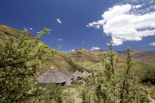 maliba lodge chalet zonnige dag.png